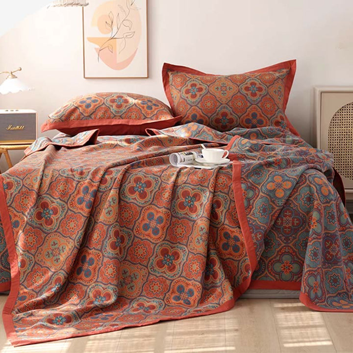 Décoration de chambre bohème avec couette réversible motifs mandala, apportant style et confort à votre lit.