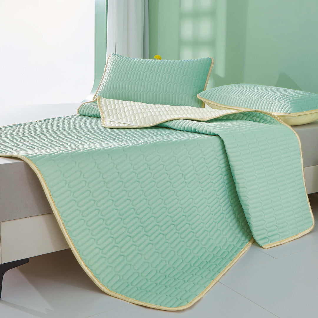 Couette d'été en latex, conçue pour un confort sans surchauffe, pour nuits chaudes.