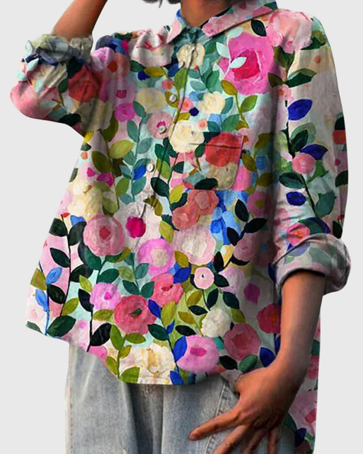 Blouse femme élégante, détails floraux délicats, parfaite pour un look printanier chic.