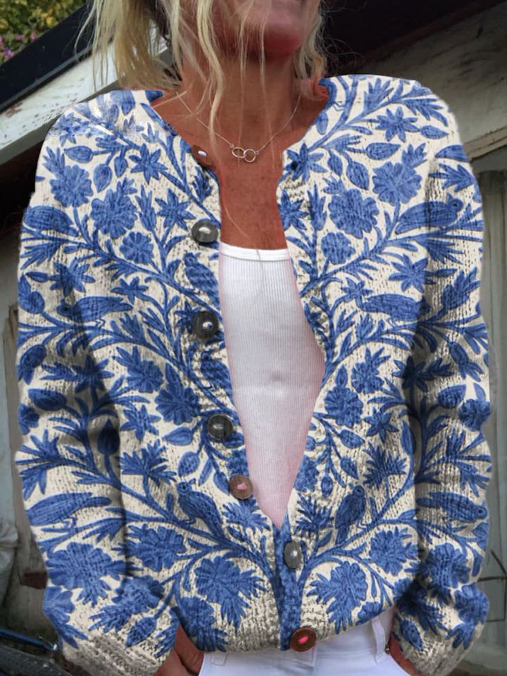 Gilet femme élégant à motif floral coloré, col rond. Idéal pour une touche chic et confortable.