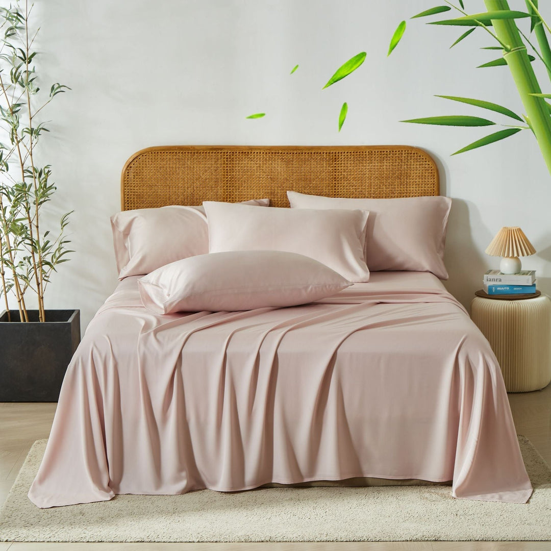 Housse de couette et draps en bambou pour un lit frais, luxueux et un sommeil réparateur.