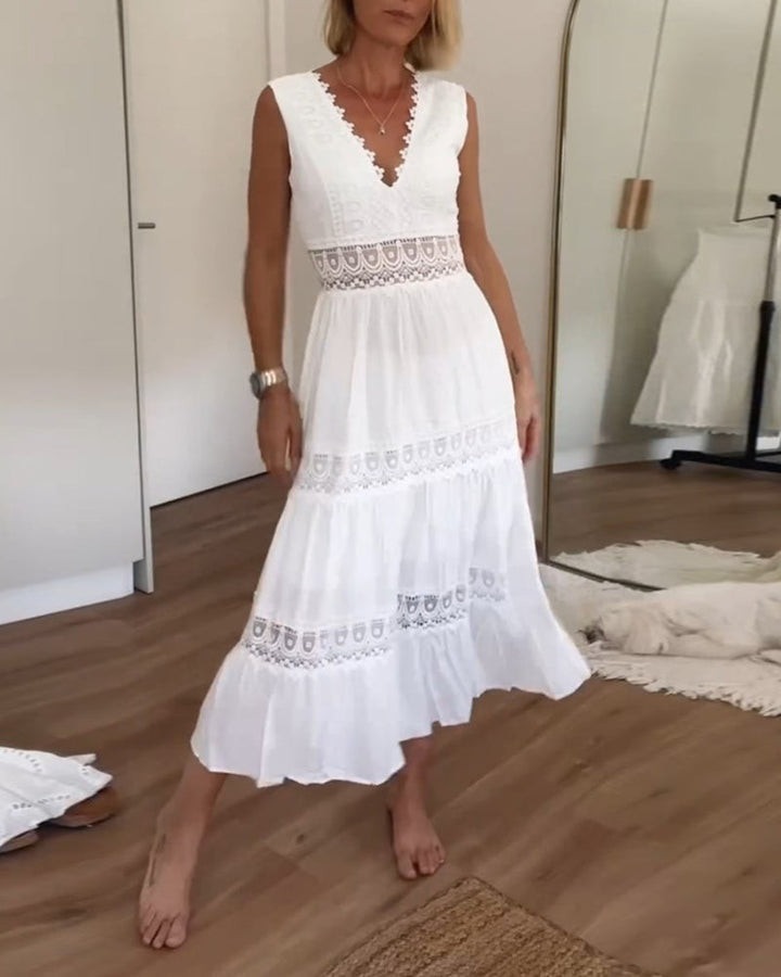 Robe midi fluide femme élégante, col V, sans manches, idéale pour l'été et le printemps.