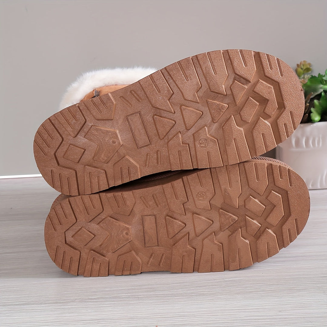 Bottines hiver femme, élégantes et chaudes. Idéales comme chaussures de neige avec semelle antidérapante.