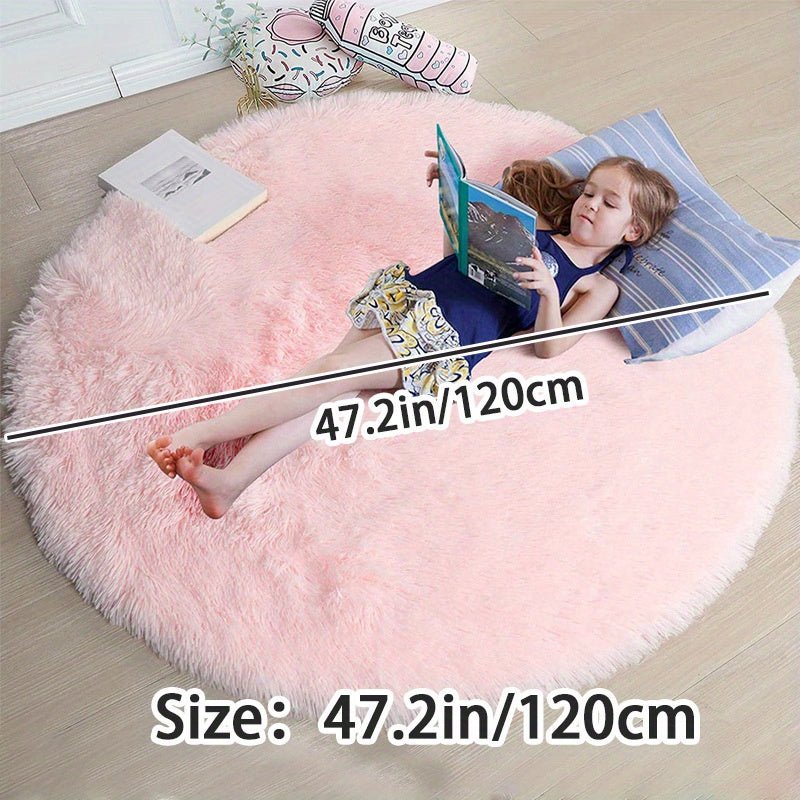 Tapis rond Clouda gris, très doux et agréable au toucher, parfait pour le confort.