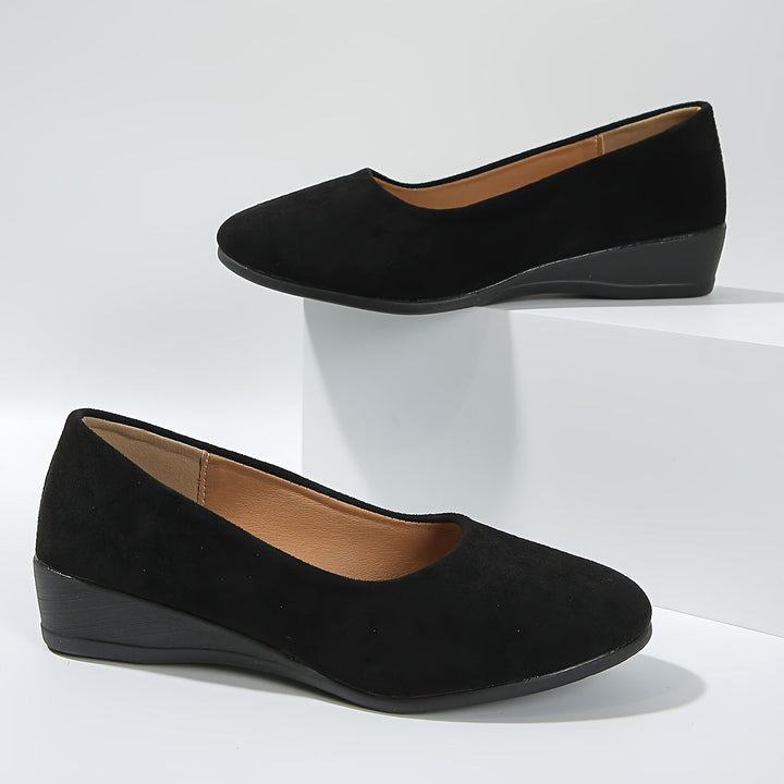 Ballerines femme à talon compensé, offrant confort et stabilité pour une marche agréable au printemps/été.