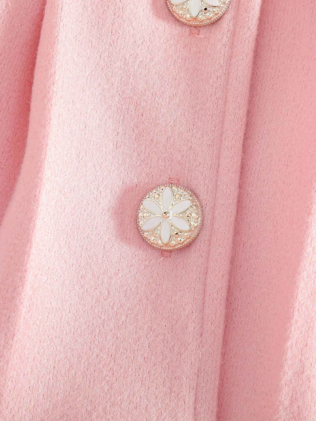 Manteau fille rose poudré avec nœud délicat et col en peluche. Idéal pour un hiver chaud et élégant.