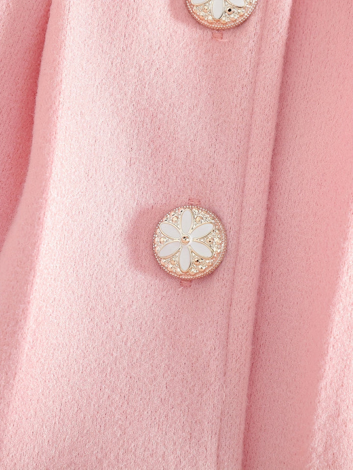 Manteau fille rose poudré avec nœud délicat et col en peluche. Idéal pour un hiver chaud et élégant.