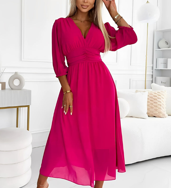 Robe femme élégante à manches mi-longues, coupe flatteuse. Idéale pour le bureau ou les soirées. Chic et polyvalente.