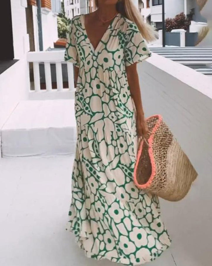 Robe longue fleurie Ester vert crème pour femme, manches courtes volantes. Élégance estivale décontractée, imprimé floral.