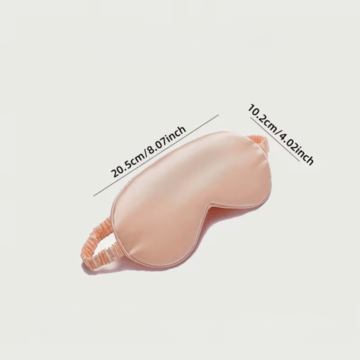 Masque sommeil en soie unisexe, essentiel pour le repos et la détente nocturne.