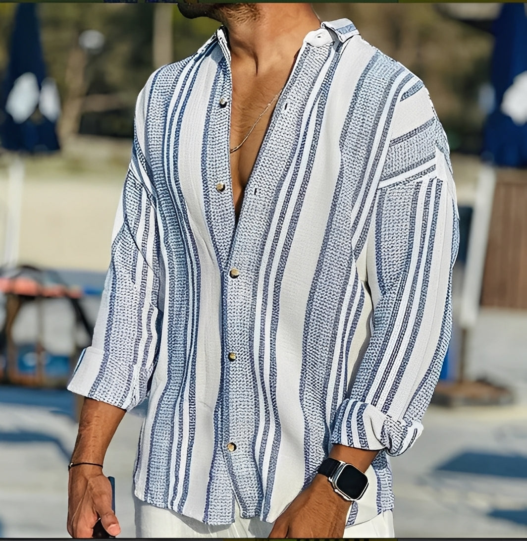 Élégante chemise homme rayée pour un style chic et polyvalent. Confortable, elle s'adapte à la mode masculine casual.