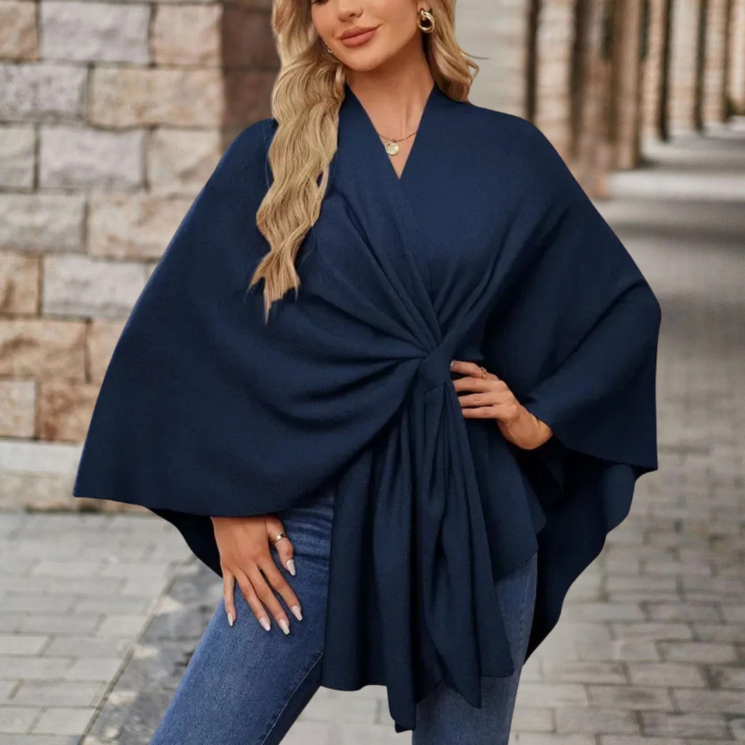 Poncho élégant femme, parfait pour un look mode automnal. Confort et style assurés.