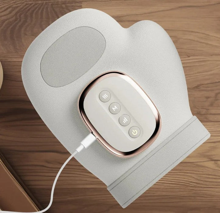 Appareil de soin des mains sans fil pour relaxation, soulageant la douleur des mains par massage et chaleur.