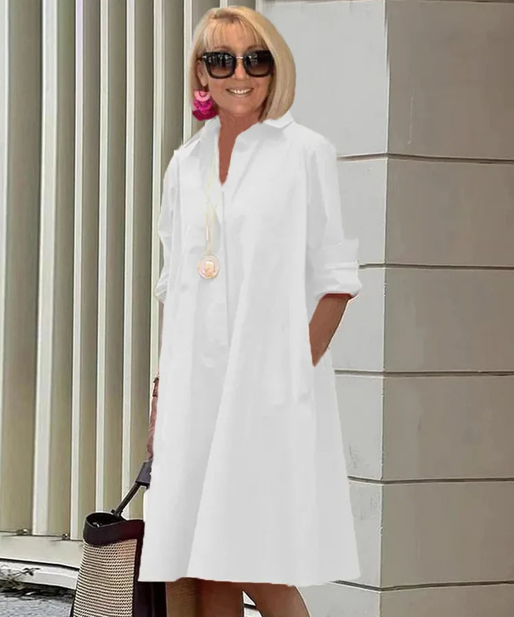 Robe chemise femme chic, tissu fluide et confortable, design moderne et élégant pour l'été.