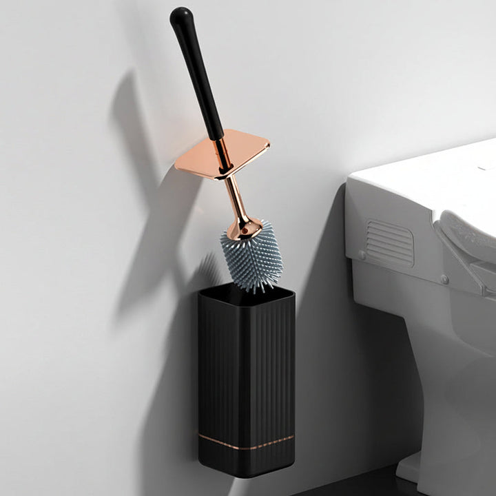 Brosse de nettoyage WC en silicone, support discret, pour un entretien facile et une hygiène impeccable.