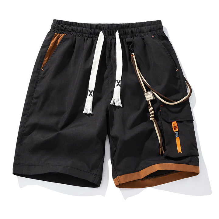 Short de sport homme avec poche latérale pratique, confortable pour les activités extérieures et le quotidien.