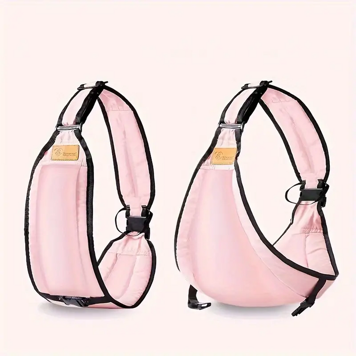 Porte-bébé ergonomique ajustable rose, idéal pour un portage confortable et sécurisé des bébés.