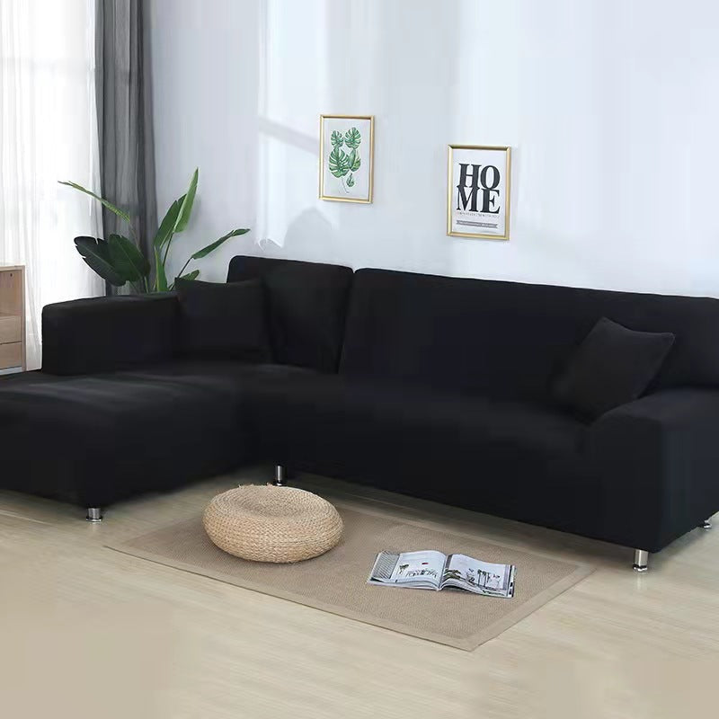 Housse canapé extensible facile à installer. Transforme votre salon en quelques minutes. Décoration express.