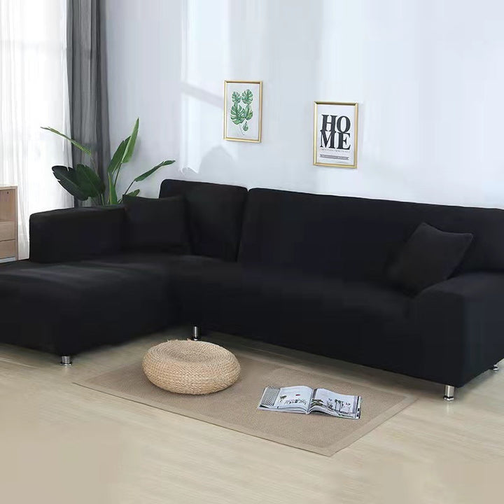 Housse canapé extensible facile à installer. Transforme votre salon en quelques minutes. Décoration express.
