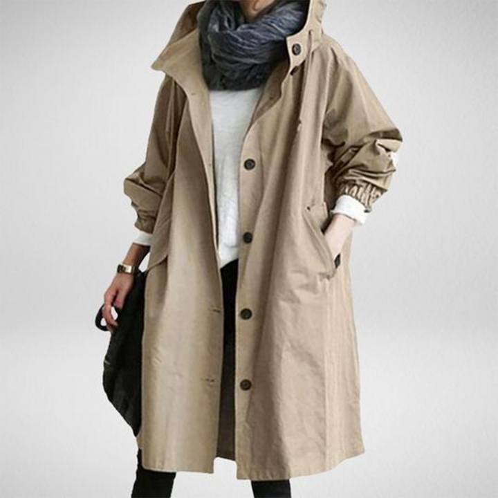 Vêtement de pluie femme élégant, imperméable et respirant, idéal pour les sorties décontractées.