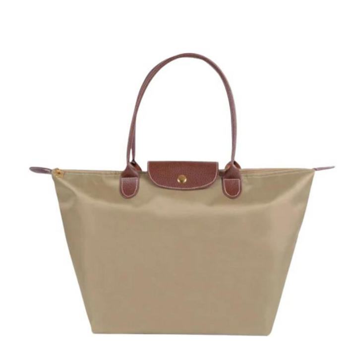 Accessoire de mode femme: sac à main tendance, parfait pour le voyage ou le quotidien. Tote bag élégant et stylé.