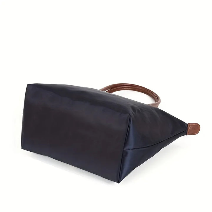 Grand tote bag femme moderne, sac à main élégant et tendance, parfait pour le quotidien et les accessoires de mode.