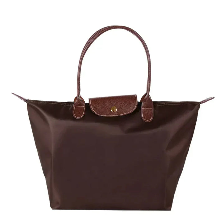 Sac à main femme chic, tote bag élégant et tendance pour le quotidien, accessoire de mode pratique et stylé.