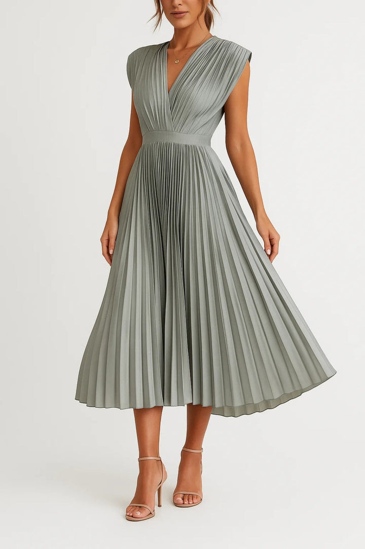 Robe midi plissée femme, décolleté en V, taille cintrée. Design chic pour toute occasion élégante.