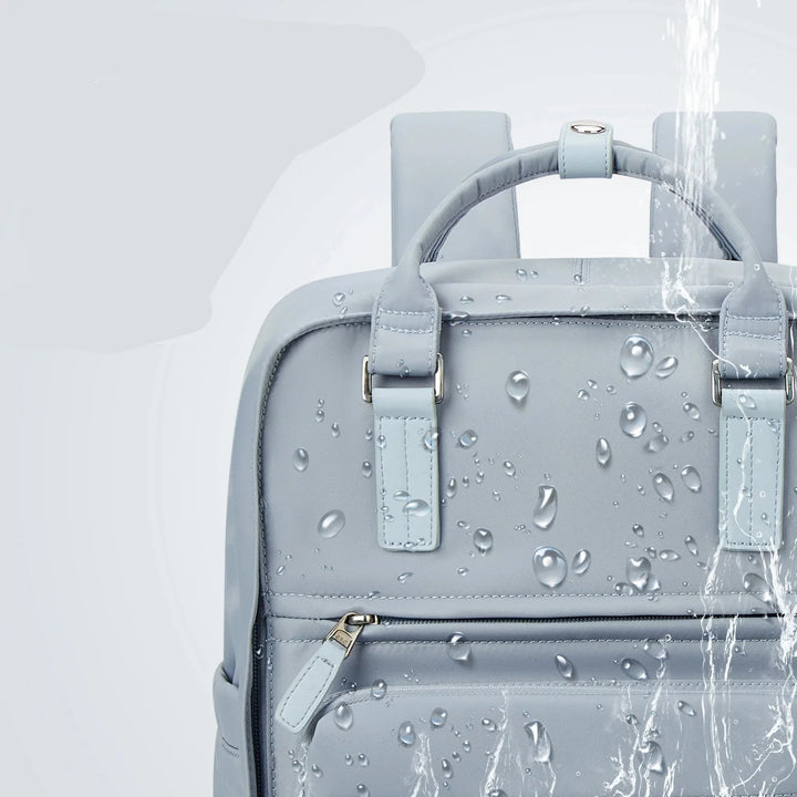 Sac à dos femme chic pour ordinateur portable, design organisé et matériau imperméable. Idéal pour le quotidien.