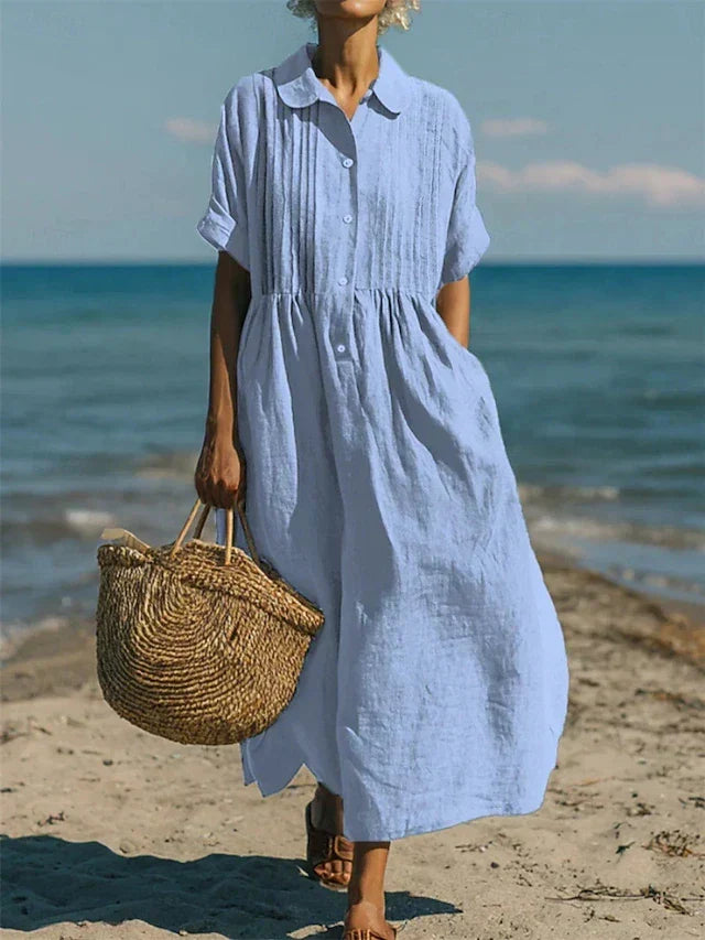 Robe midi fluide en coton pour femme, coupe décontractée chic, idéale printemps-été, boutonnée.