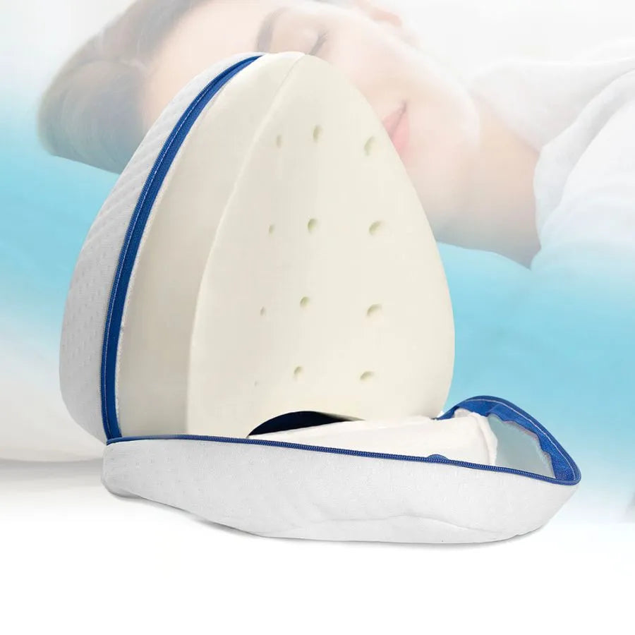 Coussin ergonomique pour alignement des jambes, réduisant la sciatique et les douleurs dorsales pendant le sommeil.