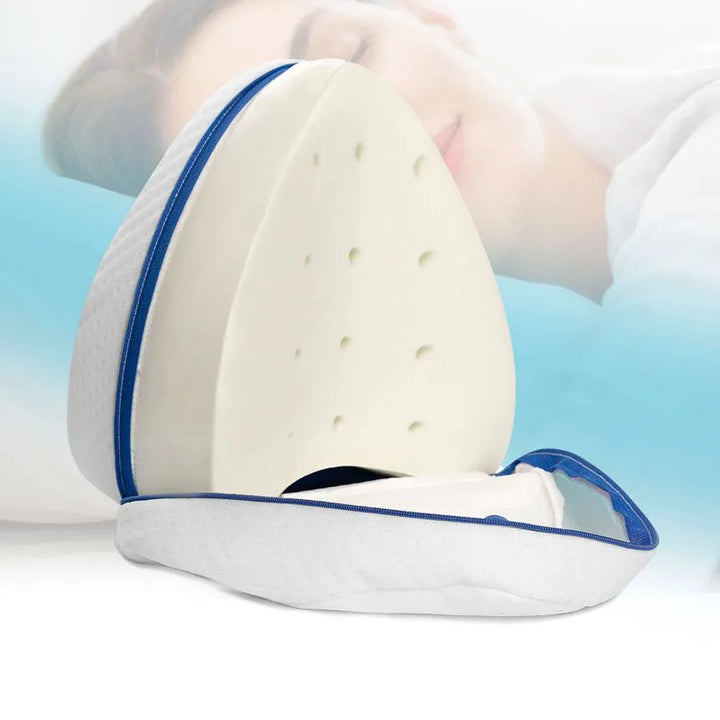 Coussin ergonomique pour alignement des jambes, réduisant la sciatique et les douleurs dorsales pendant le sommeil.