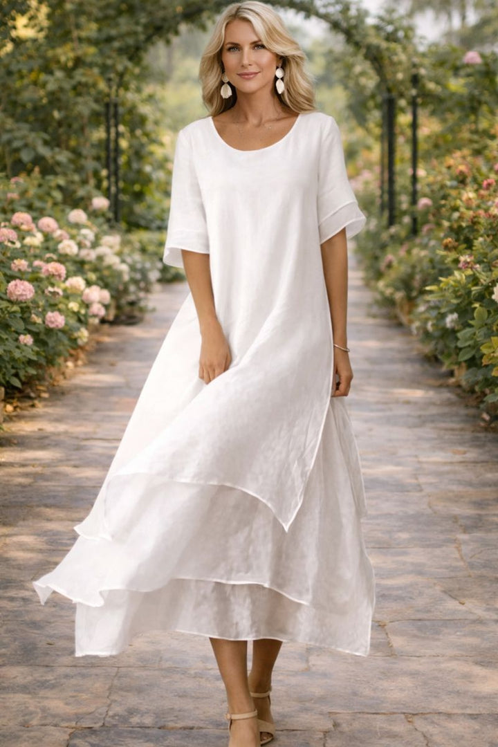 Robe midi fluide femme avec décolleté, parfaite pour soirée, mariage, cérémonie. Grandes tailles.