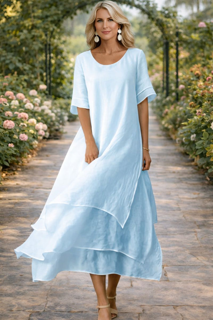 Robe femme midi fluide et confortable, tenue chic pour cérémonie, mariage, invitée de soirée.