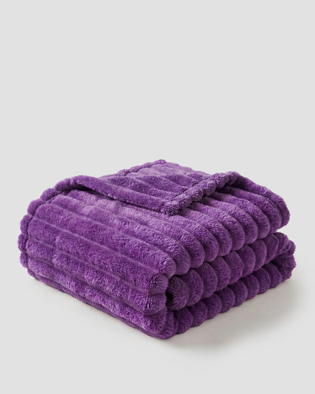 Plaid doux et léger, idéal pour les soirées d'été et le confort de la maison.