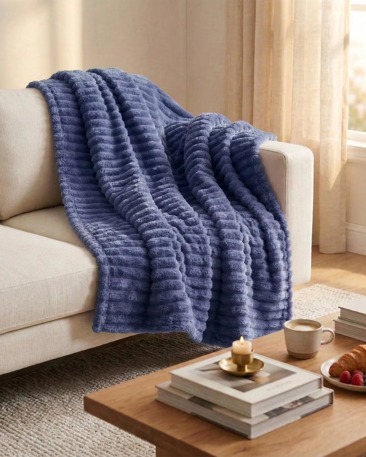 Plaid confortable, doux au toucher, parfait pour la décoration intérieure.