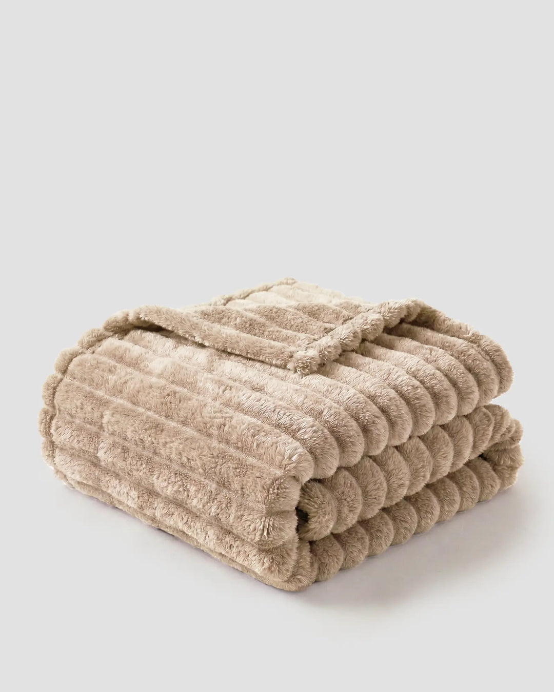 Couverture douce et agréable, idéale pour la décoration du salon.