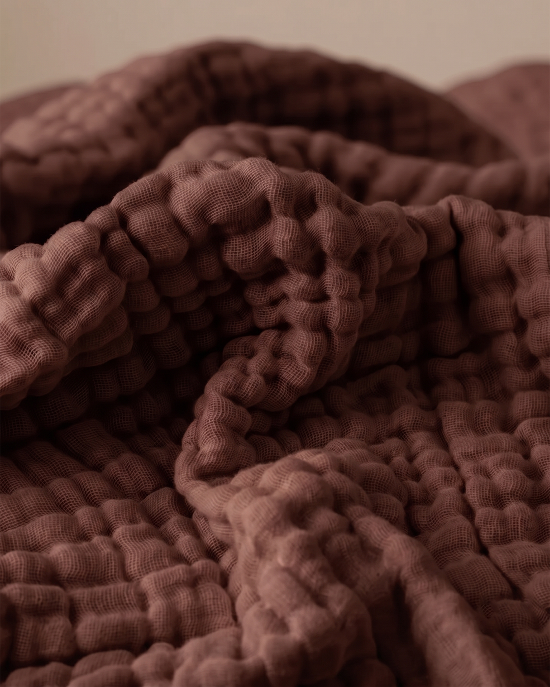 Plaid en coton, doux, respirant, élégant, pour un confort naturel et durable au quotidien.