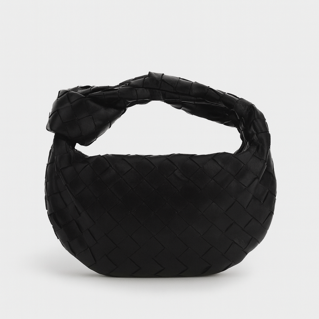 Sac à main tissé élégant femme, finition artisanale chic, accessoire mode indispensable.