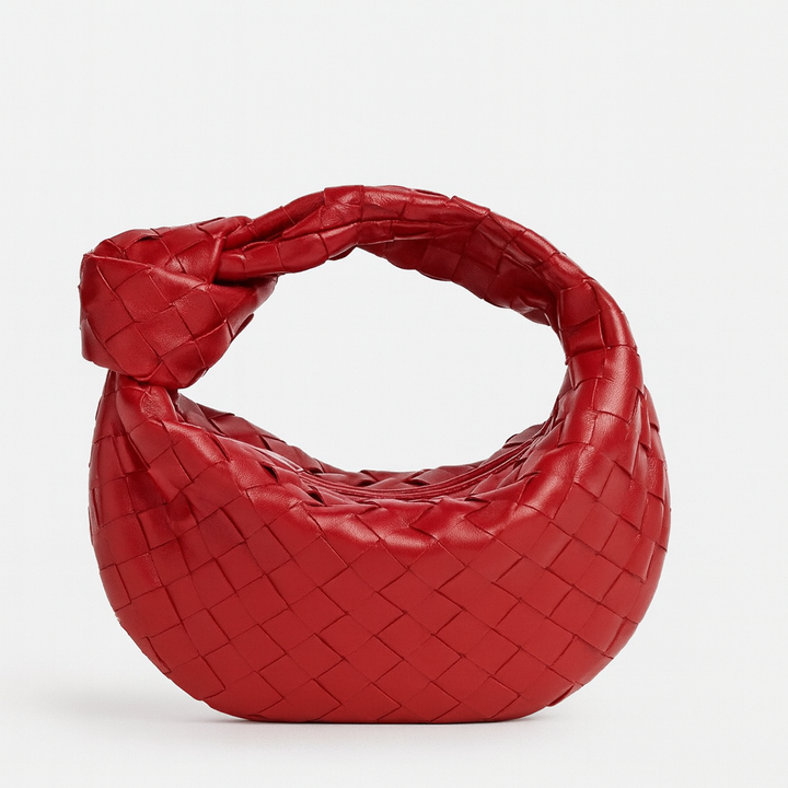 Sac à main tissé femme avec bandoulière, design chic et élégant, style artisanal mode actuel.