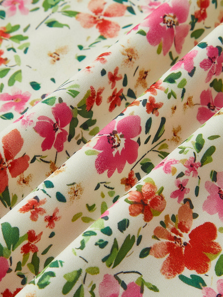 Élégante robe midi florale femme, imprimé estival chic, mode féminine pour l'été.