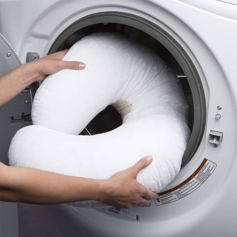 Coussin de sommeil ergonomique pour bébé, forme optimisée pour confort et sécurité des nourrissons, 0-12 mois.