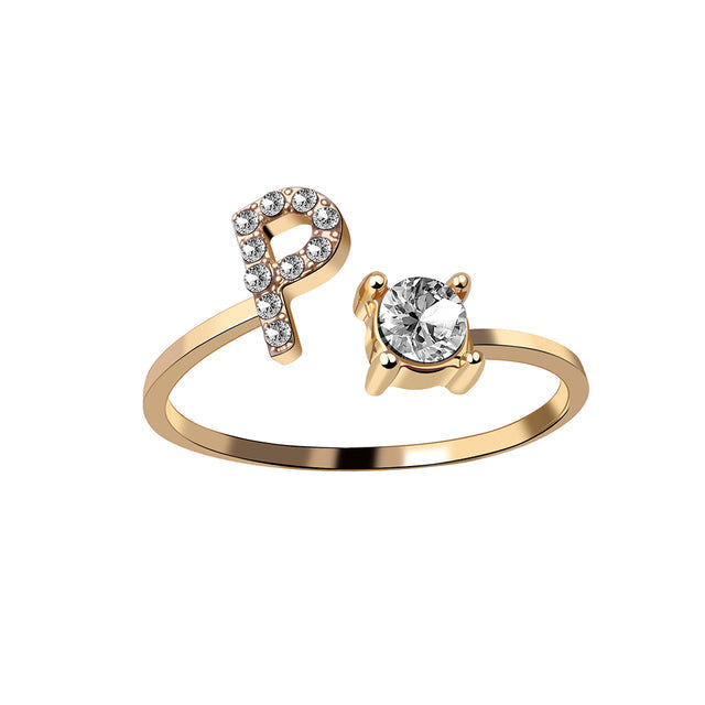 Bague alphabet ajustable en or, bijou féminin, souvenir unique.