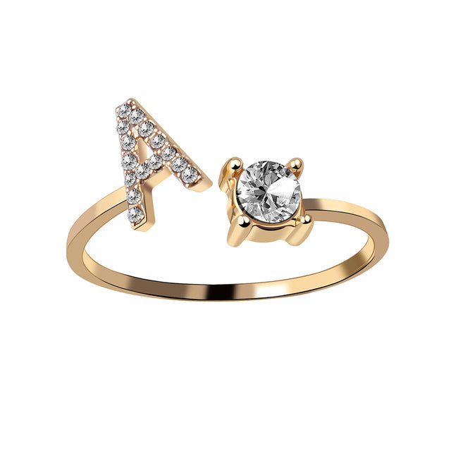 Bague alphabet or, ajustable, bijou personnalisé femme élégant.