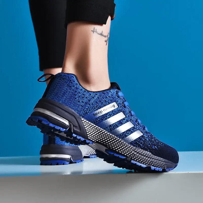 Baskets de running homme/femme, design aéré. Confort optimal pour la course, le fitness et la marche.