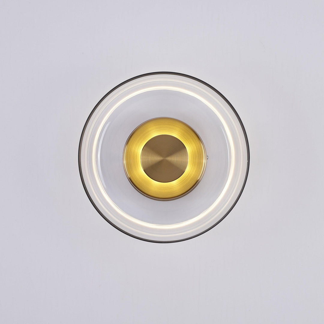 Luminaire mural LED laiton et verre, lumière froide, décoration moderne couloir.