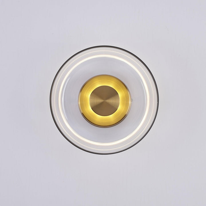 Luminaire mural LED laiton et verre, lumière froide, décoration moderne couloir.