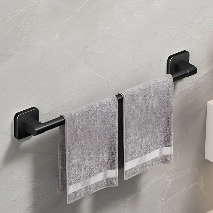 Porte-serviettes noir minimaliste autocollant pour salle de bain, maintient vos serviettes à portée de main.