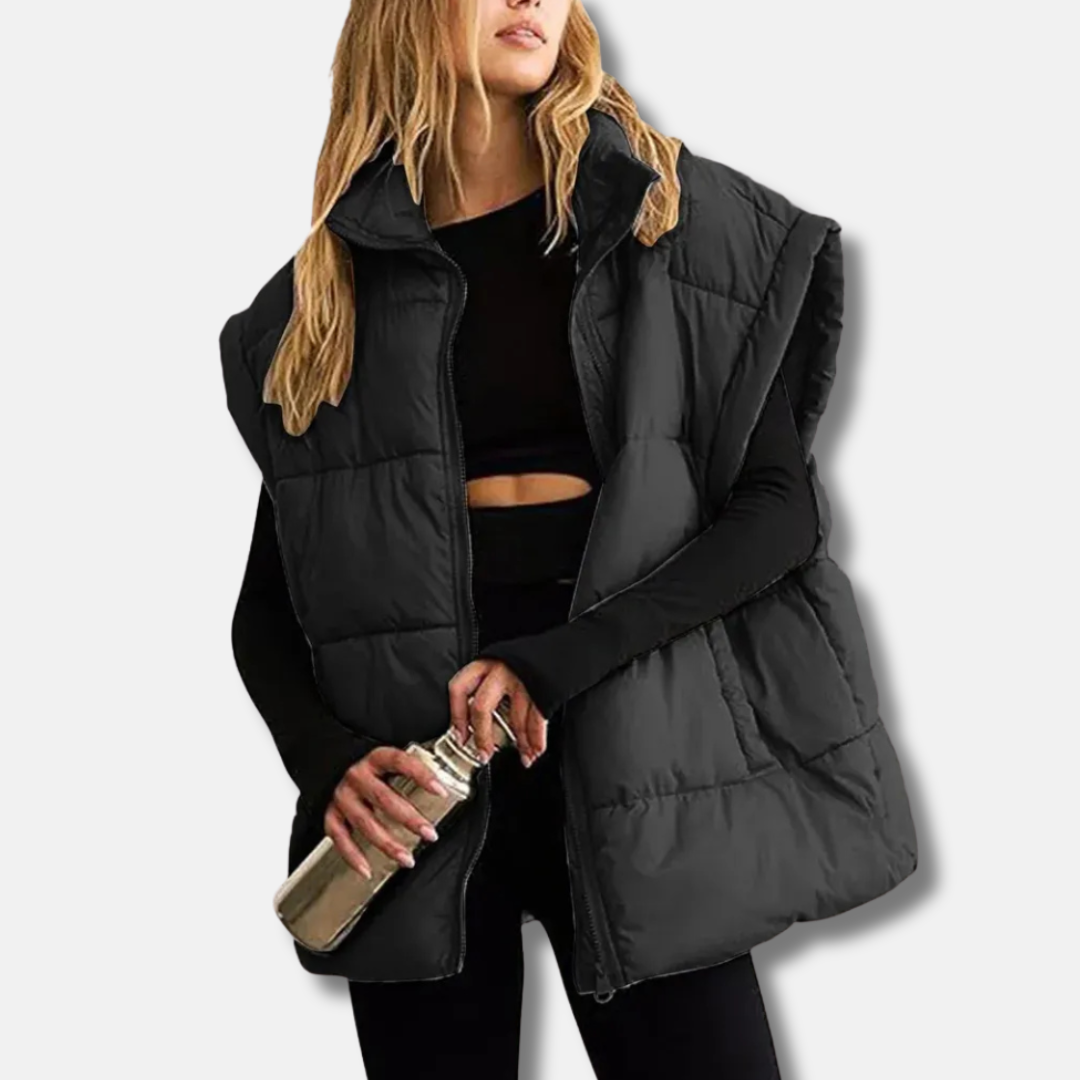Veste sans manches femme matelassée chaude et légère avec col montant. Style polyvalent pour temps frais.