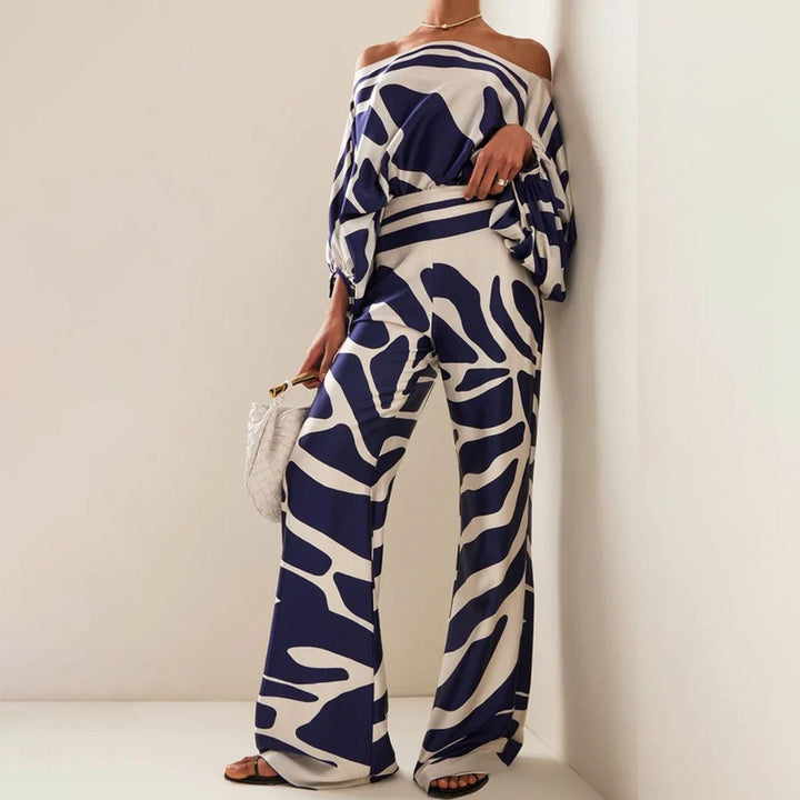 Faites sensation avec cet ensemble femme élégant : top épaules dénudées et pantalon large taille haute. Parfait pour l'été.